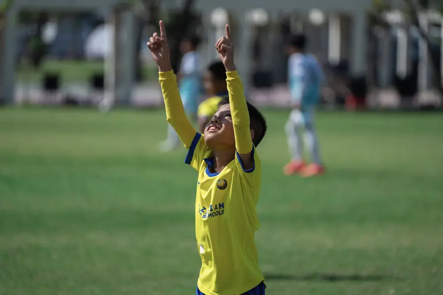 Young BSS Bintaro player training with the ball